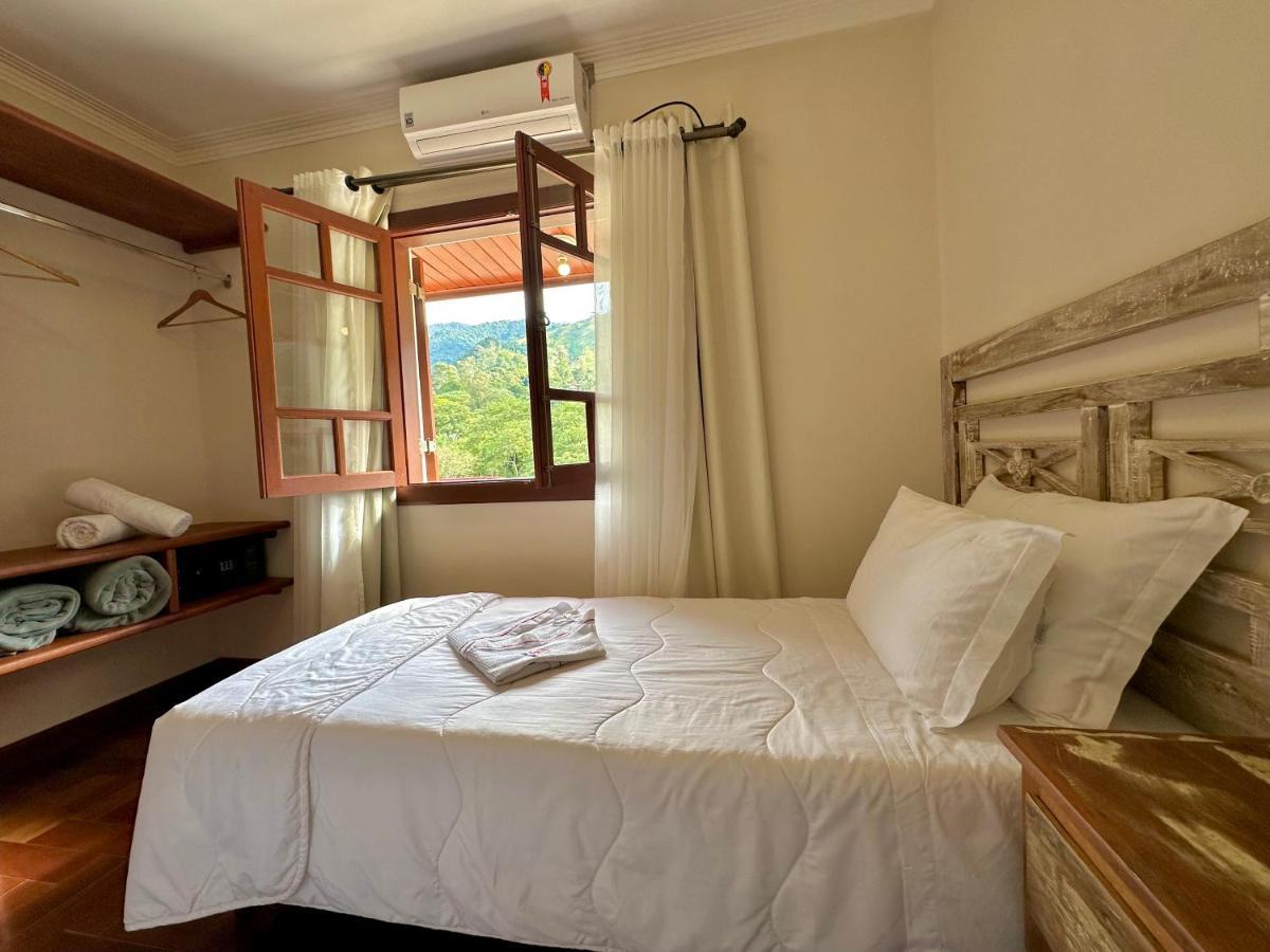 Pousada Aldeia Manacas Sao Bento do Sapucai Bagian luar foto
